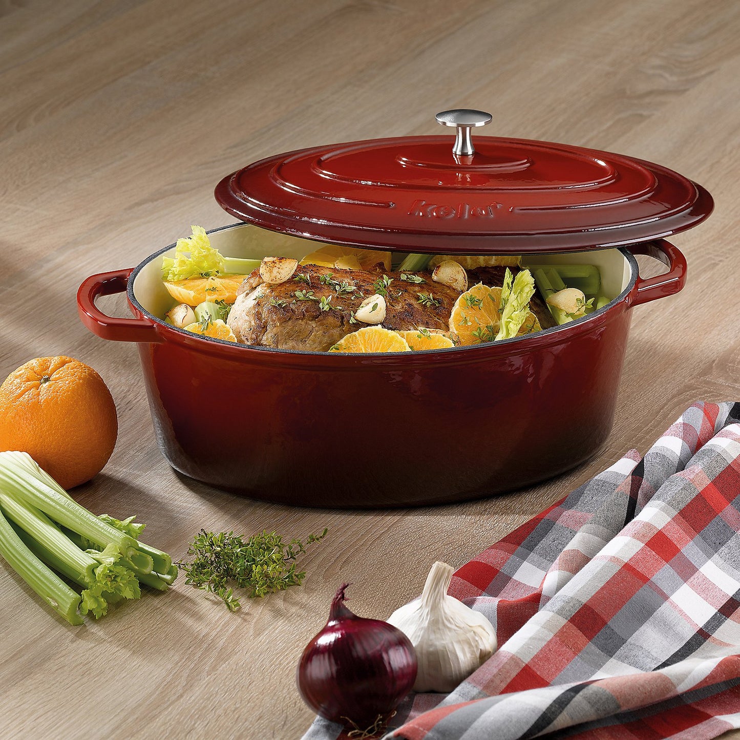 KELA Calido Ovale Braadpan 33 × 26 cm (6,0 L) – Luxe gietijzer in opvallend rood met beige geëmailleerde binnenzijde
