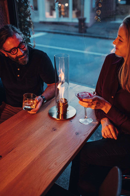Höfats SPIN 90 Tafelvuur – Goud/transparant – Breng sfeer, stijl en vuur samen in één uniek designstuk